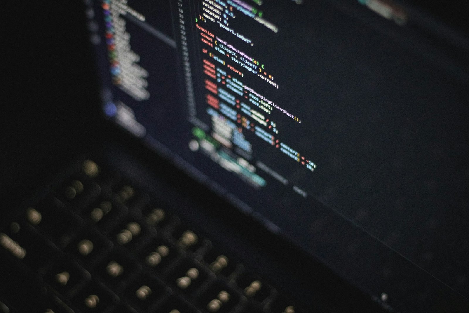Close-up of colourful programming code on a laptop screen